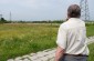 Stanislaw B., born 1931, showing the team one of the sites of Stalag 319, where 200 000 POWs were incarcerated from July 1941 to April 1944, suffering from starvation, diseases, forced labor and frequent executions. ©Olga Szymerowska/Yahad - In Unum