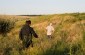 Viktor Sh., born in 1927, leading the Yahah team to the killing site of Jewish victims on the outskirts of  the village of Buzynove. ©Svitlana Kovaliova/Yahad - In Unum
