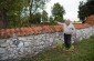 Jozef L. showing Yahad team the execution site in the Jewish cemetery in Bełżyce, where about 100 Jewish children and disabled people were killed in 1943. ©Jordi Lagoutte/Yahad - In Unum