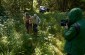 Igla C., born in 1935, guiding the Yahad team to the killing site in the Bodnieki Forest in Naukšēni parish. ©Jordi Lagoutte/Yahad - In Unum