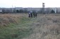 © “I asked SS-Hauptsturmführer F. to describe precisely the place where the Jews had to be shot. It was a former Russian anti-tank trench located between Hirschdorf and Kerch. […] When I was on the road from Kerch to Hirschdorf, the trench was on the right. […] F. told me that about 2,000 Jews would be shot there. […] Trucks with men, women and children arrived from Kerch. […] They were transported to a field by truck. Then, in groups of 20-30 the Jews were escorted to the anti-tank trench and lined up at the same level as the shooting commando. The shooting commando was composed of five or six SS men. The Jews had to jump into the trench and stand up facing the wall. […] I saw twice how one SS man getting down in the pit with a rifle shooting children in the nape of the neck. Those children, as I said before, did not cry, but, were very frightened, looked around sitting on the dead bodies of their dead mothers.” [Deposition letter of Josef F., Wermacht soldier, Giessen, Germany, on February 13, 1965, BArch B162-986]. Yahad-In Unum team interviewing one of the witnesses in Kerch during the field research in 2004. © Guillaume Ribot /Yahad-In Unum