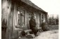 Kraziai, Lithuania, A bearded Jew next to a wooden house © Yad Vashem